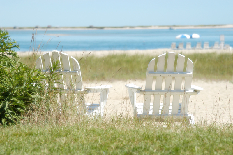 two beach chairs on the beach